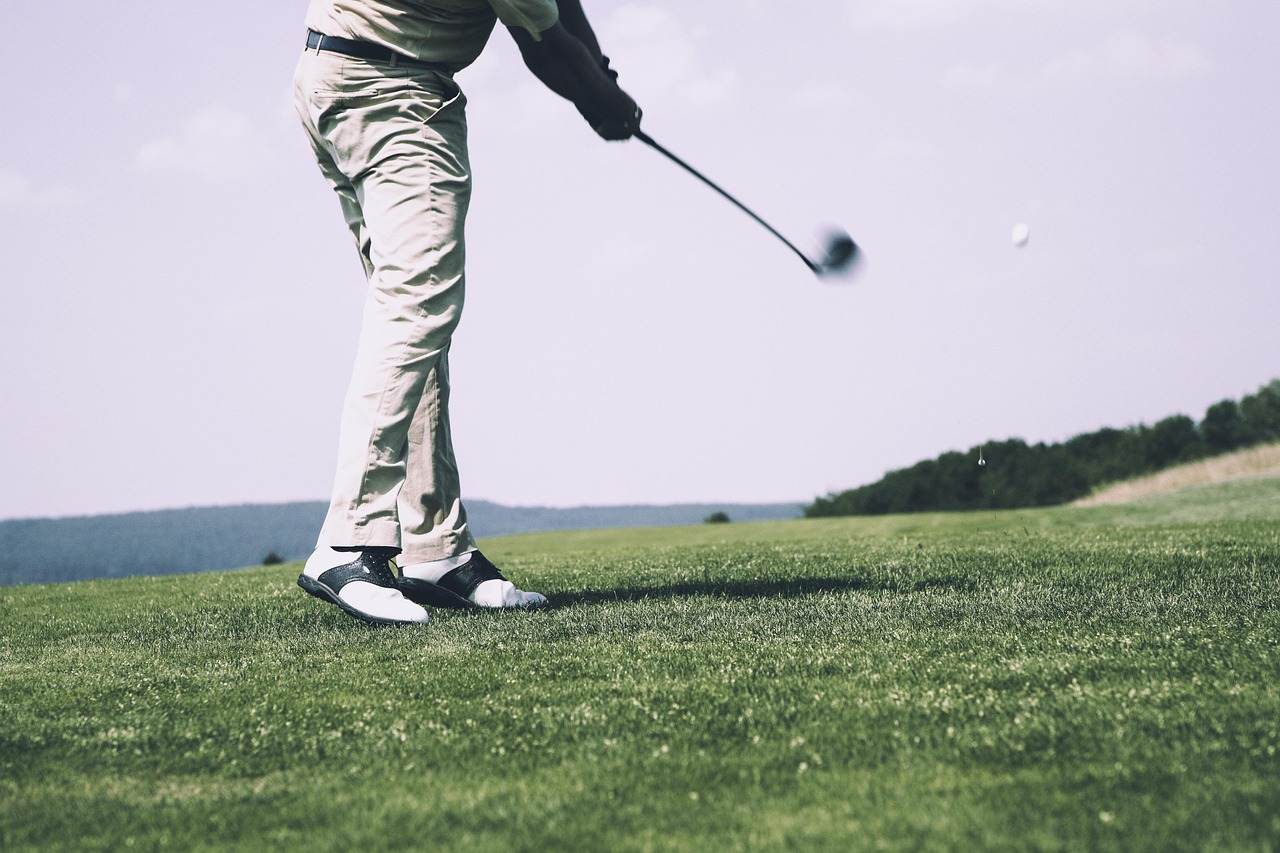 Golf ball on a tee on a golf course