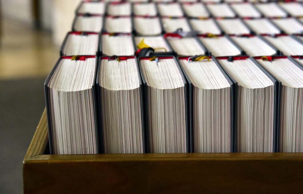 Prayer book open in a church pew