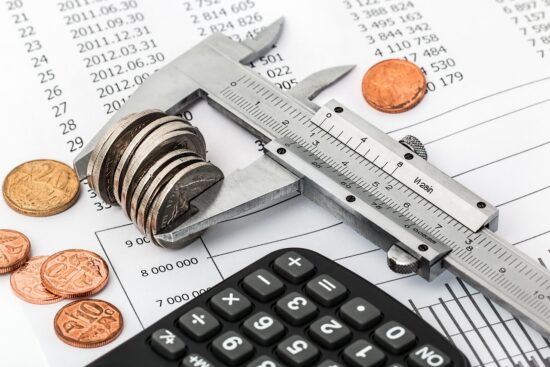 Coins set aside in a savings jar