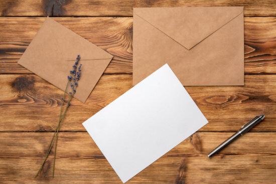 Vintage letters and envelopes on a wooden table